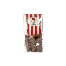 Load image into Gallery viewer, 4.	“Kleine holle chocolade Sintfiguurtjes van 250 gram in een transparant zakje met de tekst ‘Wie zoet is krijgt lekkers’.”
